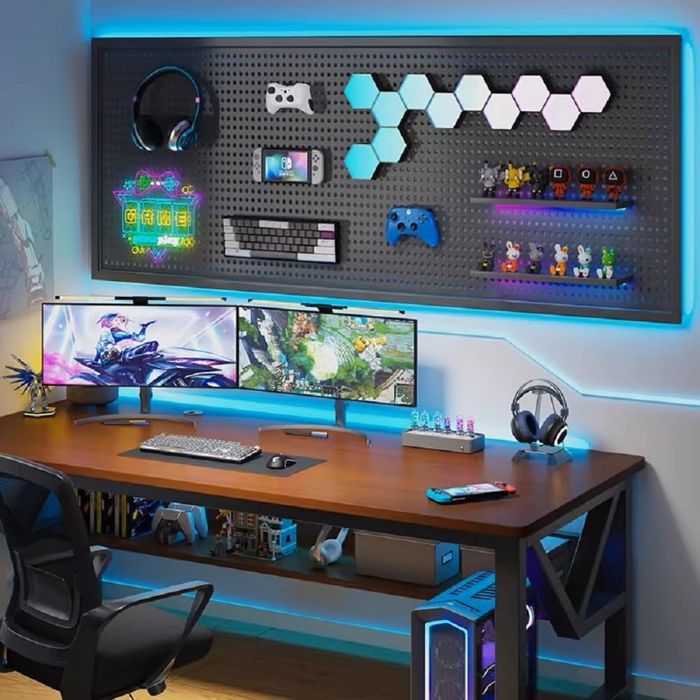 Gaming setup with a desk, monitors, and wall-mounted pegboard in a room with blue LED lighting.