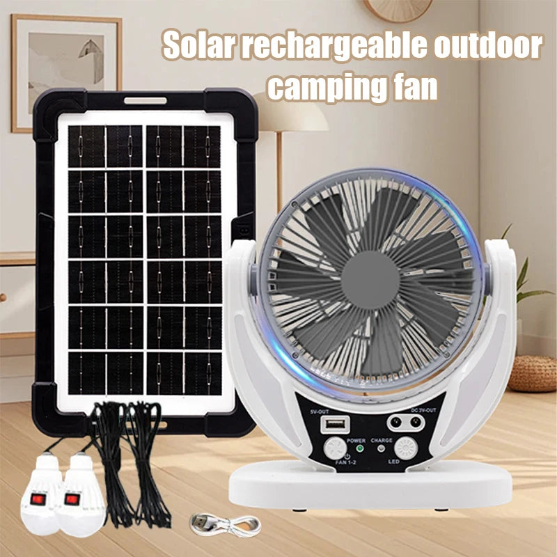 Solar rechargeable outdoor camping fan with solar panel and accessories on a wooden surface.