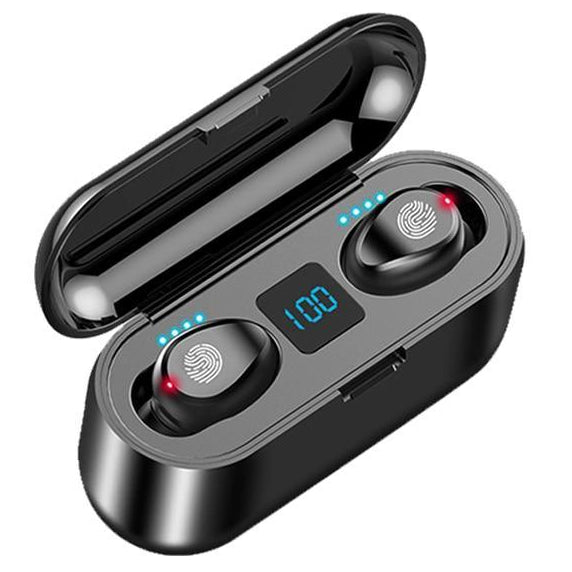 Black wireless earbuds in a charging case on a white background