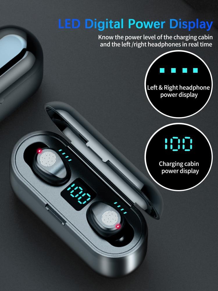 Wireless earbuds with charging case and LED digital power display on a dark background