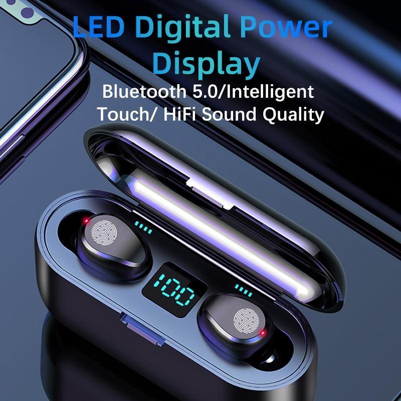 Wireless earbuds with charging case and LED digital display on a dark background