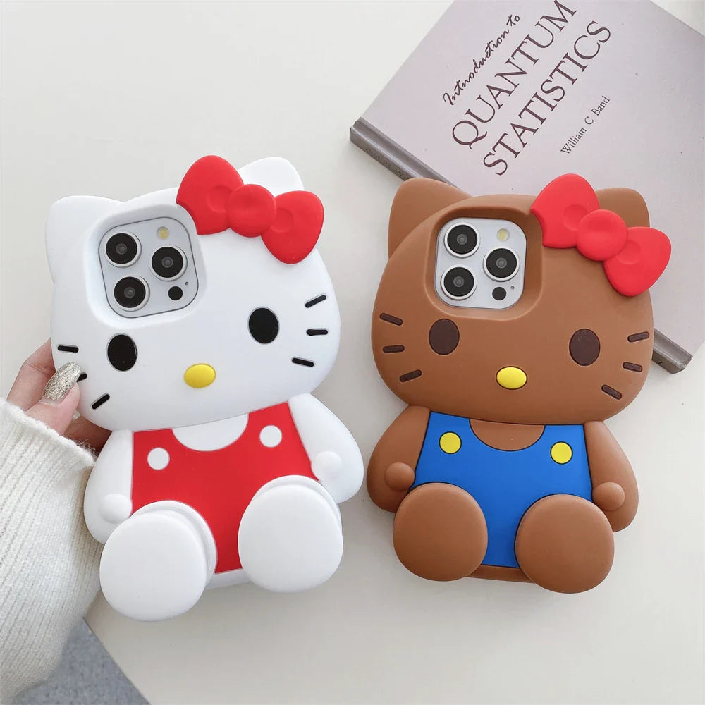 Two cartoon-style phone cases shaped like cats with red bows on a light background.