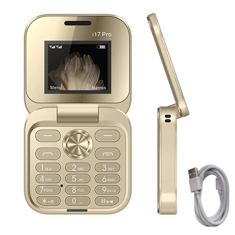 Gold flip phone with USB cable on a white background
