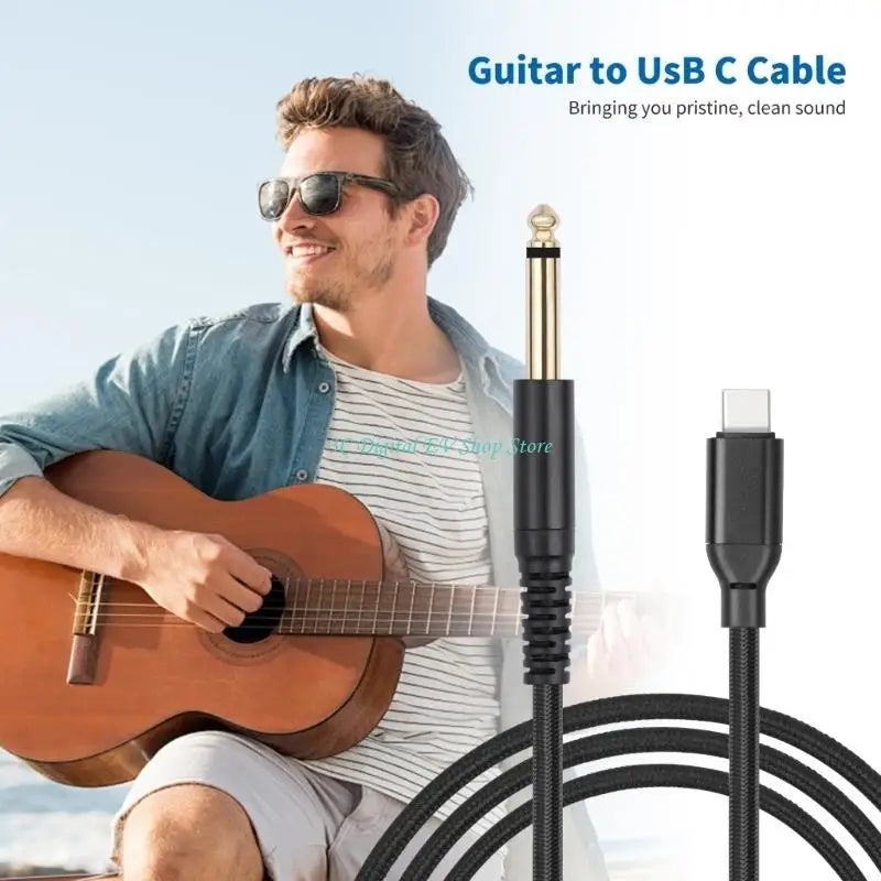 Man playing guitar with a guitar to USB-C cable overlay