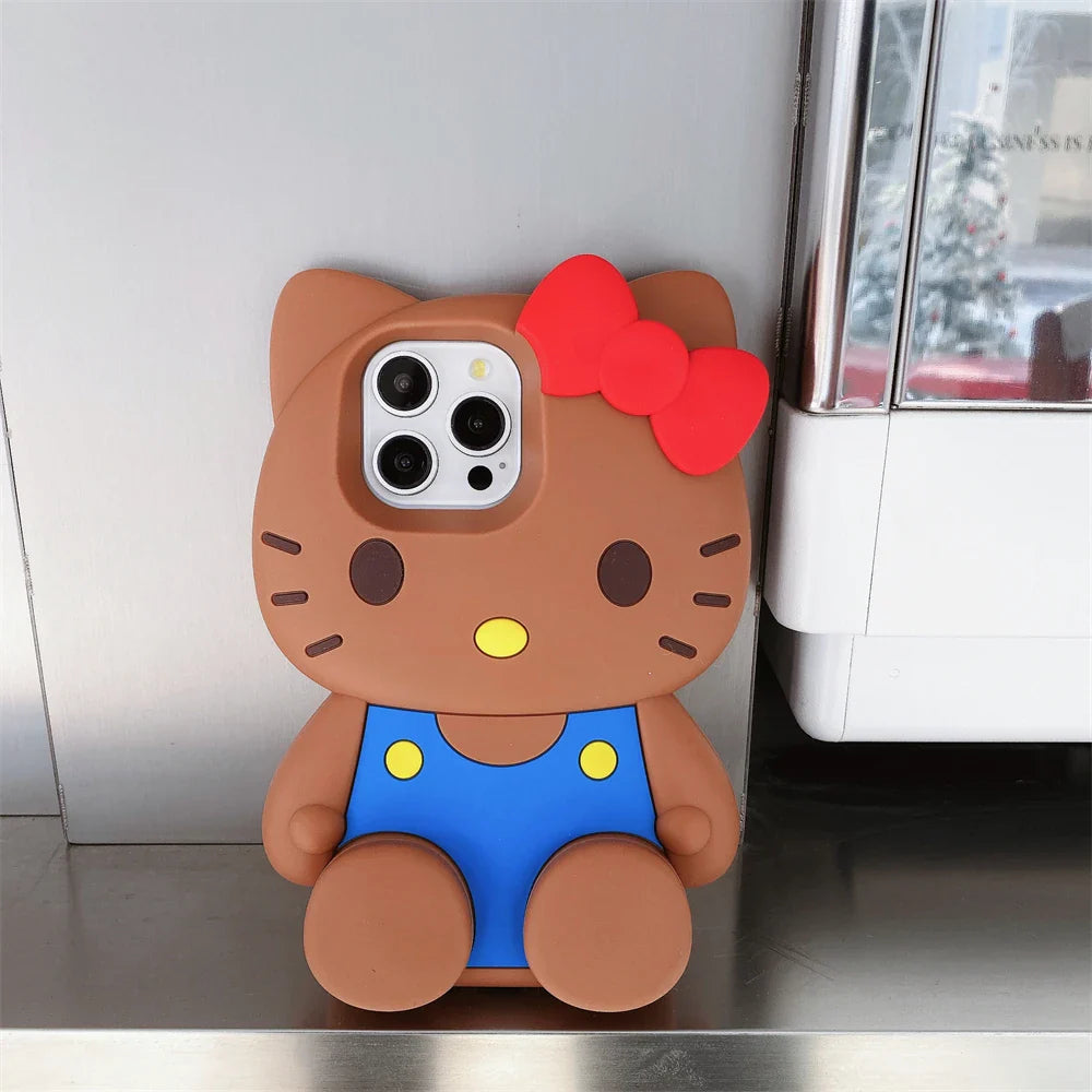 3D cat-shaped phone case with a red bow on a metallic surface