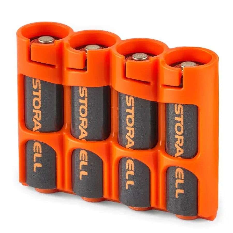 Set of four orange batteries with black labels on a white background