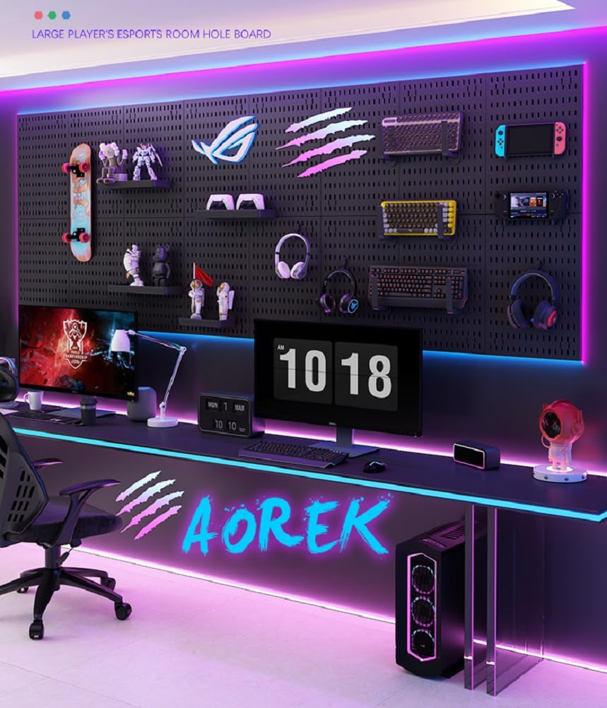 Gaming setup with LED lighting and 'AOREK' branding on a desk.